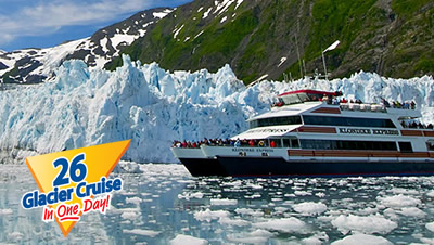 Catamaran navigating close to the massive glaciers on the 26 Glacier Cruise