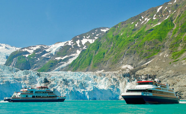 High-speed catamaran approaching a spectacular tidewater glacier face in Prince William Sound, Alaska