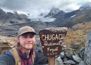Captain Ryan with the Chugach National Forest Sign